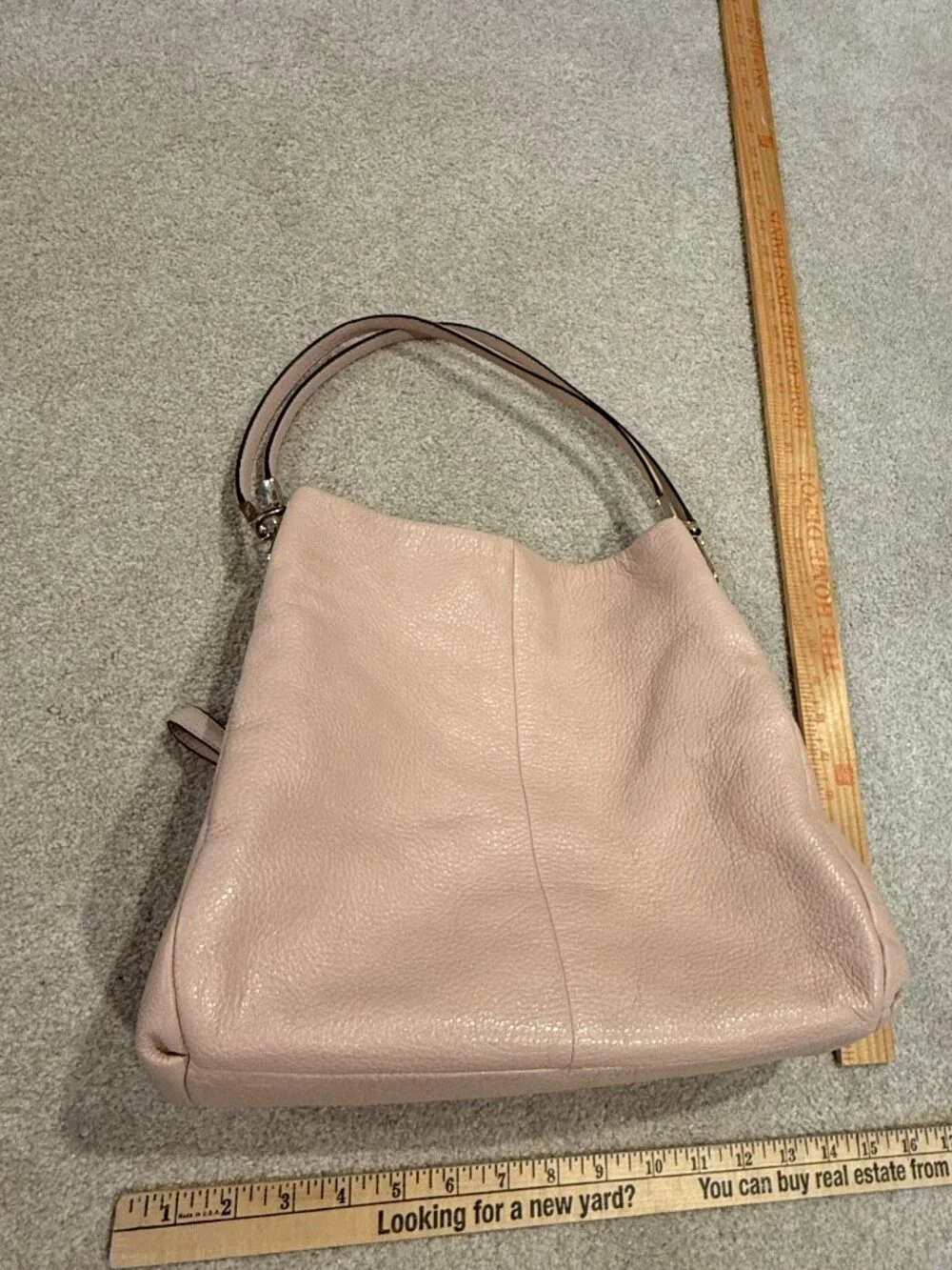 Coach Madison Phoebe handbag, featured in a soft blush pink pebbled leather
